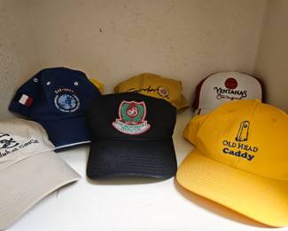 A few of the many golfing hats from various clubs around the world