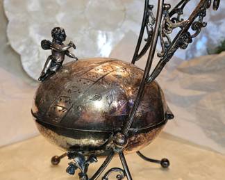 Silver plated egg opens. Circa 1890. shown before cleaning