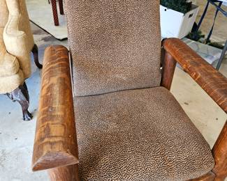 Tiger oak Morris chair with leopard print upholstery