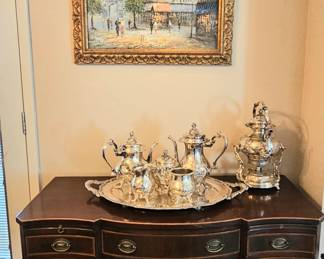 Street scene by Bennett, silver plate coffee and tea service with tilting hot water kettle, mahogany small-scale desk.