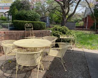 Vintage yellow cast round table with 4 chairs, a small etager, and tea cart. Again, very heavy.
