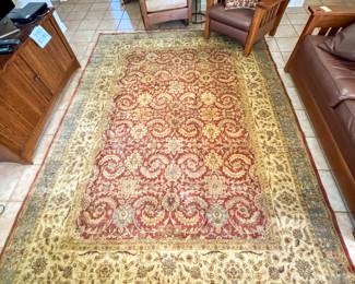 Gorgeous rug in living room that was professionally cleaned recently. 
