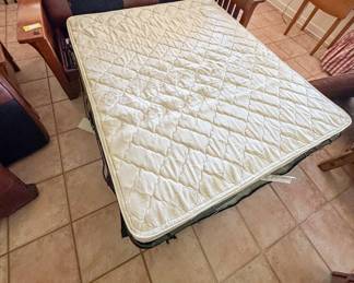 Sleeper sofa pulled out. 