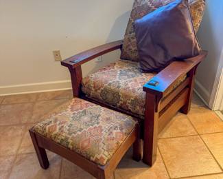Leopold Stickley chair and matching ottoman. 