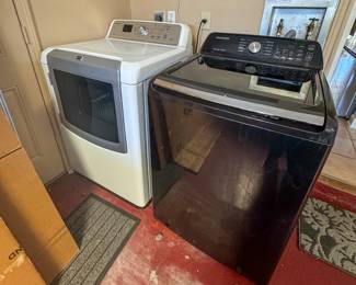 Maytag electric dryer and Samsung washing machine. Both in working order. Located in garage. 