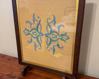 Beautiful antique framed stitch work. 