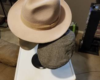 Men's hats include these and several others and a large Gene Autry style cowboy hat