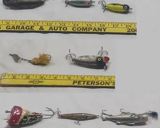 antique fishing lure collection, several lots like this one and some lures are in the original boxes, many are wooden. also old fishing reels and tackleboxes in this sale.