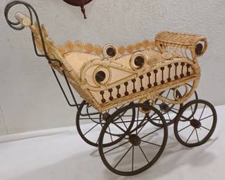 large antique wicker stick and ball spoke wheel buggy stroller