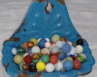 antique marbles in old enamelware soap dish