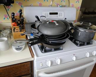 Stacks of pots and pans, and remember, we have pot and pans that are hanging too