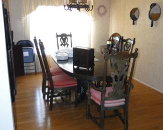 Timeless, and one of a kind dining room table and chairs