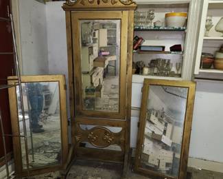 Antique dressing mirror. Side pieces resting on floor, not at correct height