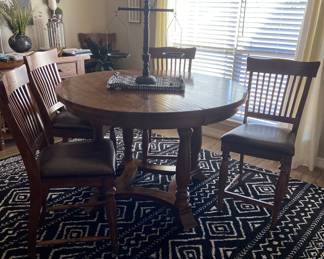 Walnut finish dining table with six chairs (counter height)