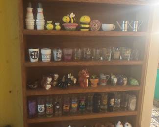 Lots of salt & pepper shakers and shot glasses 