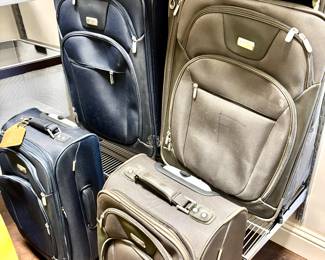 Assorted suitcases