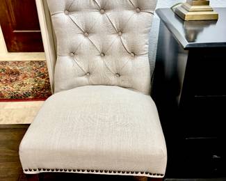 Pair of cream tufted chairs