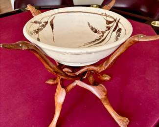 African wood base with bowl