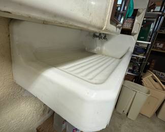 antique  cast iron farm sink.  must bring tools and help to remove.  (sink is no longer hooked up to water)