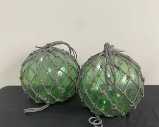 Giant Green Glass Spheres With Grey Netting