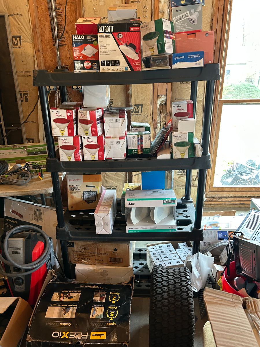 Various lightbulbs and light fixtures. Located in pool house 