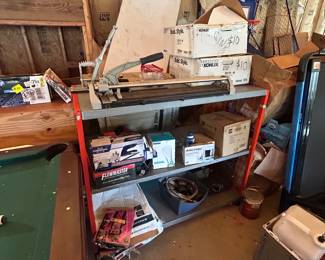 Tile cutter . Bathroom sinks and. Miscellaneous items location pool house