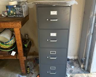 4 drawer filing cabinet. Located basement price 30.00