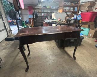 Wooden desk located basement