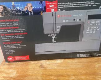 Singer sewing machine in box