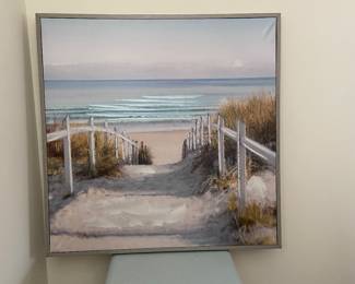 Small table and beach artwork