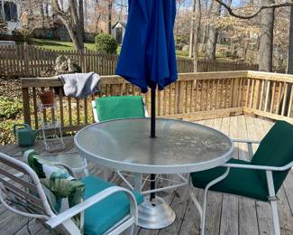 Patio table chairs and umbrella