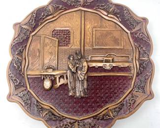 LOT 42 Register: www.woodardlipe.com ELABORATELY CARVED BOXWOOD LACQUER PLATE Diameter 11 in., depth 1.25 in. Intricate figural and intricate geometric design carved into a multilayered lacquer plate.