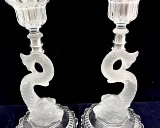LOT 156 Register: www.woodardlipe.com BACCARAT DAUPHIN CRYSTAL CANDLE LAMPS, LATE 19TH CENTURY Height in., diameter 7 in. Antique, Late 19th Century-Early 20th Century French Baccarat Dauphin Crystal Hurricane Lamps. Marked. Adorned with Prisms atop a solid cast crystal dolphin. Votive Cover has a heavy acid etched floral design.