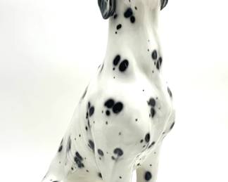 LOT 106 Register: www.woodardlipe.com LIFE-SIZED PORCELAIN ITALIAN DALMATIAN Length 20 in, width 14 in, height 33 in. Vintage life-sized dalmatian has black spots on glazed ceramic surface with blue eyes. Stamped Made in Italy on the bottom.
