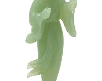 LOT 81 Register: www.woodardlipe.com CARVED SERPENTINE KWAN YIN WITH FAN ON WOODEN BASE Height 5 in., width 2 in., depth 1.25 in., Total weight 160 grams.
