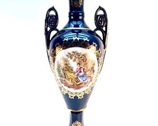LOT 159 Register: www.woodardlipe.com LARGE SEVRES FRENCH PORCELAIN COBALT LIDDED VASE Height 42 in., diameter 14 in., Very Large French Royal Sevres Porcelain Factory Vase with central medallion and gilt handles. Cobalt amphora features Neoclassical Gold Motifs and frieze with courtesans at play. Condition: Very Good, no chips or damage apparent to any surface or edges.