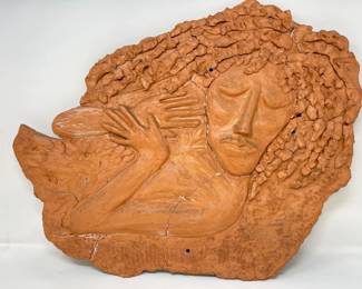 10 ImageInClayAHandSculptedWorkofArt