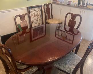 Dining table has 2 Sleeves - 6 Chairs