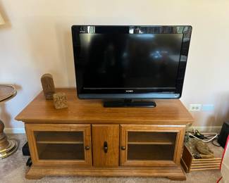 Wood Entertainment Cabinet                                                                        Sony Bravia TV with Remote Control