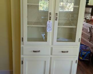 Tall vintage white cabinet with upper glaß doors