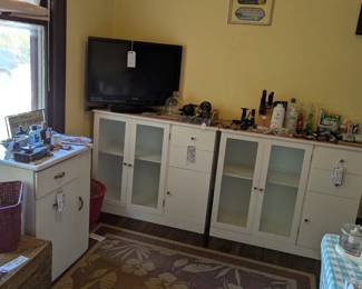 Kitchenware, barber collectibles, TV, recliner, cabinets with glass doors