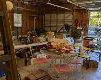 Tools, hammocks, bar height metal chairs, rattan sofa, vintage rockers, vintage outdoor tables and chairs, various "garage" items