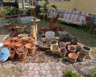 Vintage outdoor furniture and flower pots