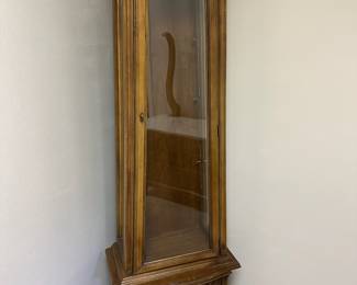Carved Obelisk Form Glass Front Curio Cabinet