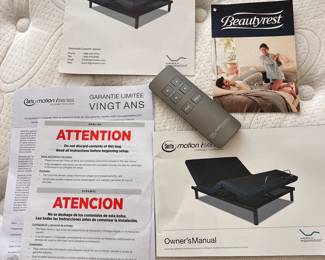 Bedroom Set #1 – Includes a queen-size adjustable Serta Motion iSeries bed (Beautyrest mattress), armoire, headboard with side cabinets, mirror, & TV stand.