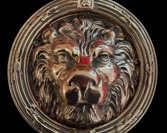 Large brass lion door knock
