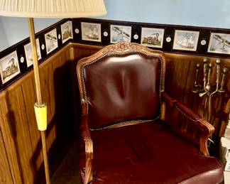 Antique floor lamp
Leather chair there are two