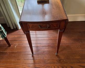 One of a pair of end tables