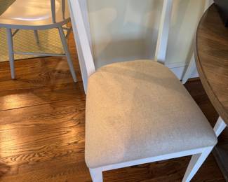 Set of painted chairs with a matching round table