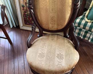 One of a pair of Victorian chairs